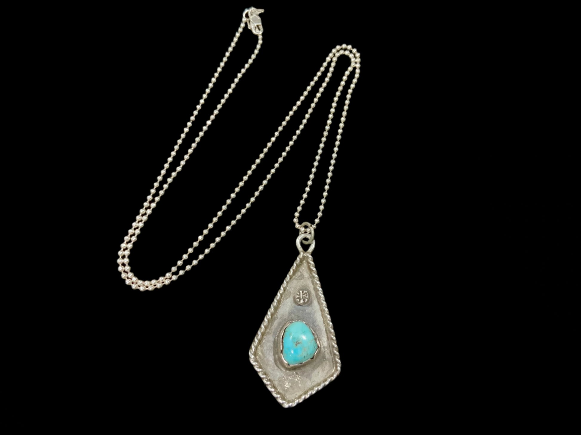 Native American turquoise sterling pendant