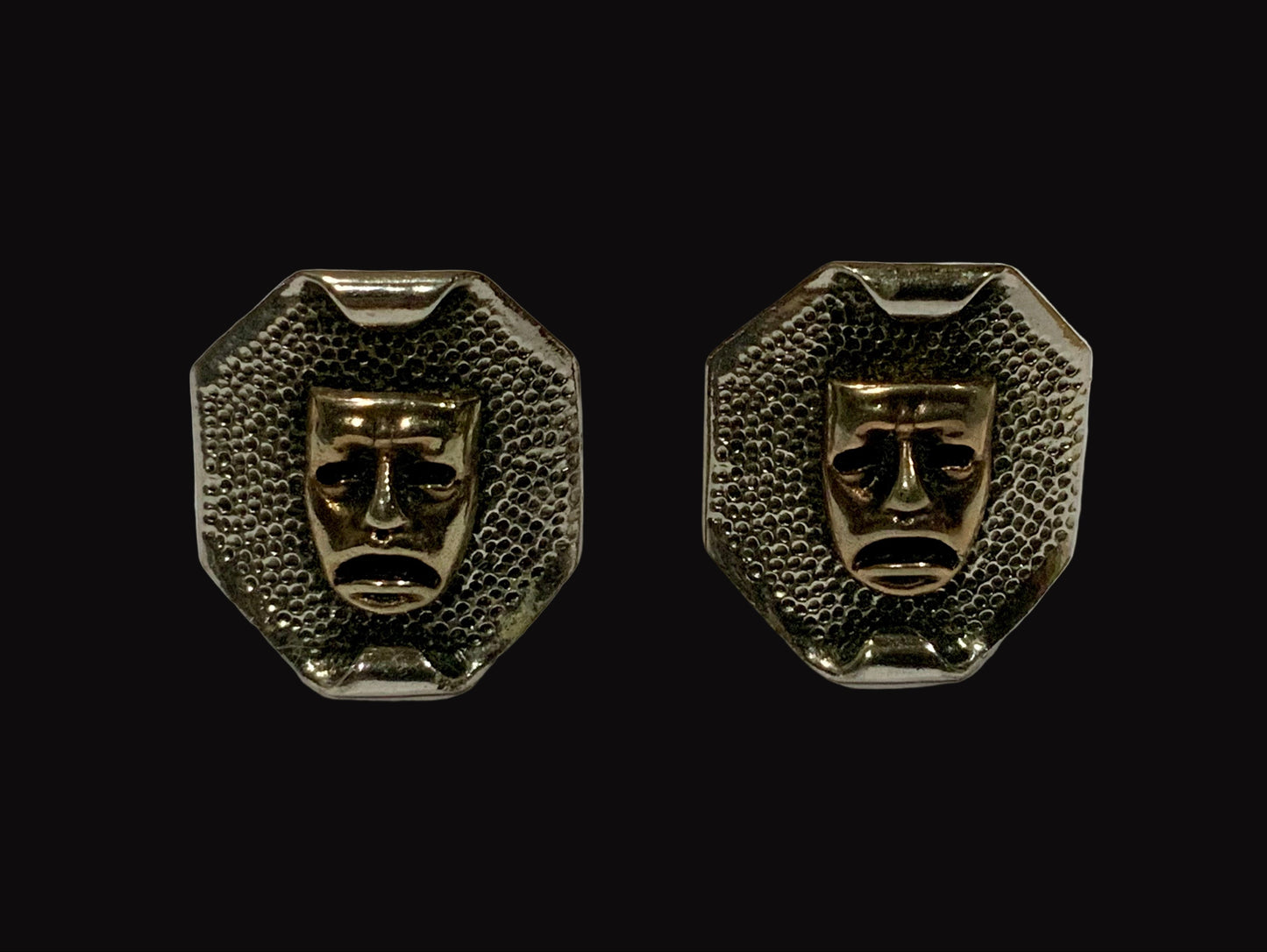 Pair of metallic face-shaped earrings Arcansas