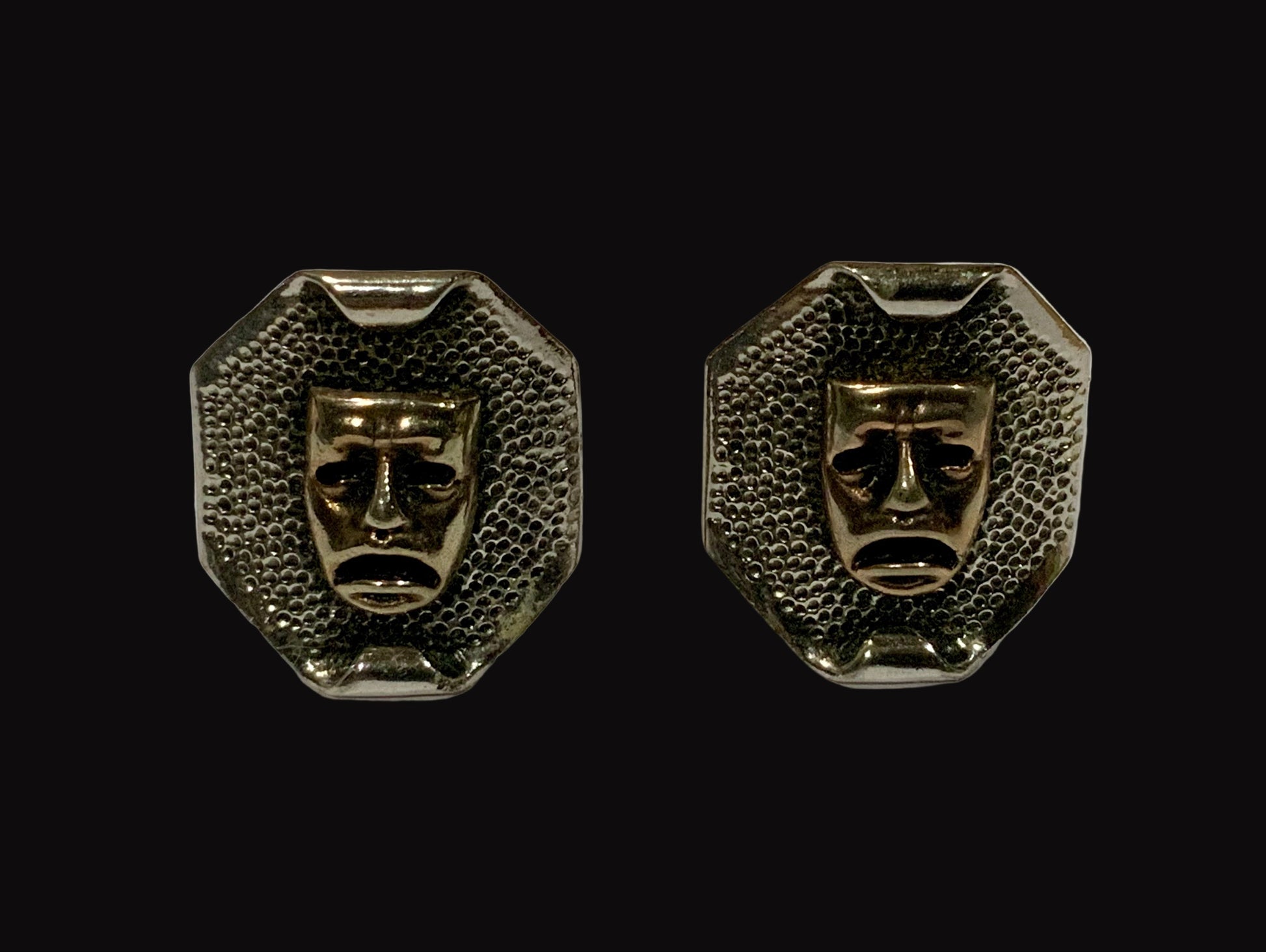 Pair of metallic face-shaped earrings Arcansas