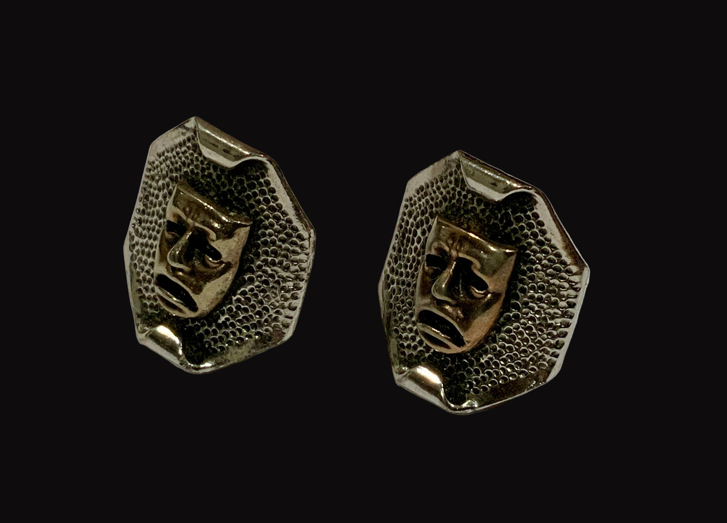 Pair of gold face-shaped earrings Elizabeth reimer